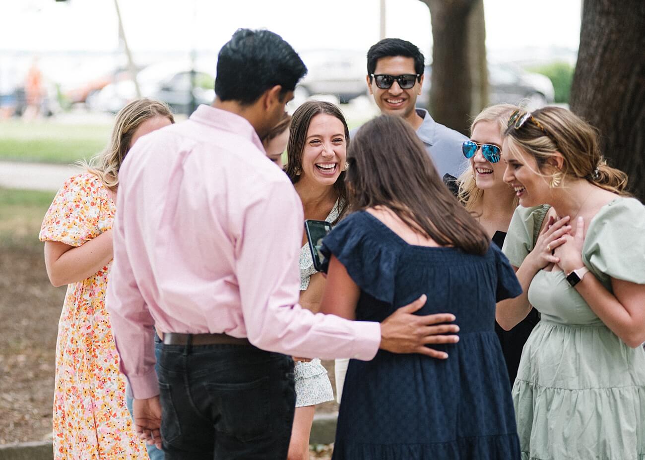 Young bride-to-be surprised during engagement proposal