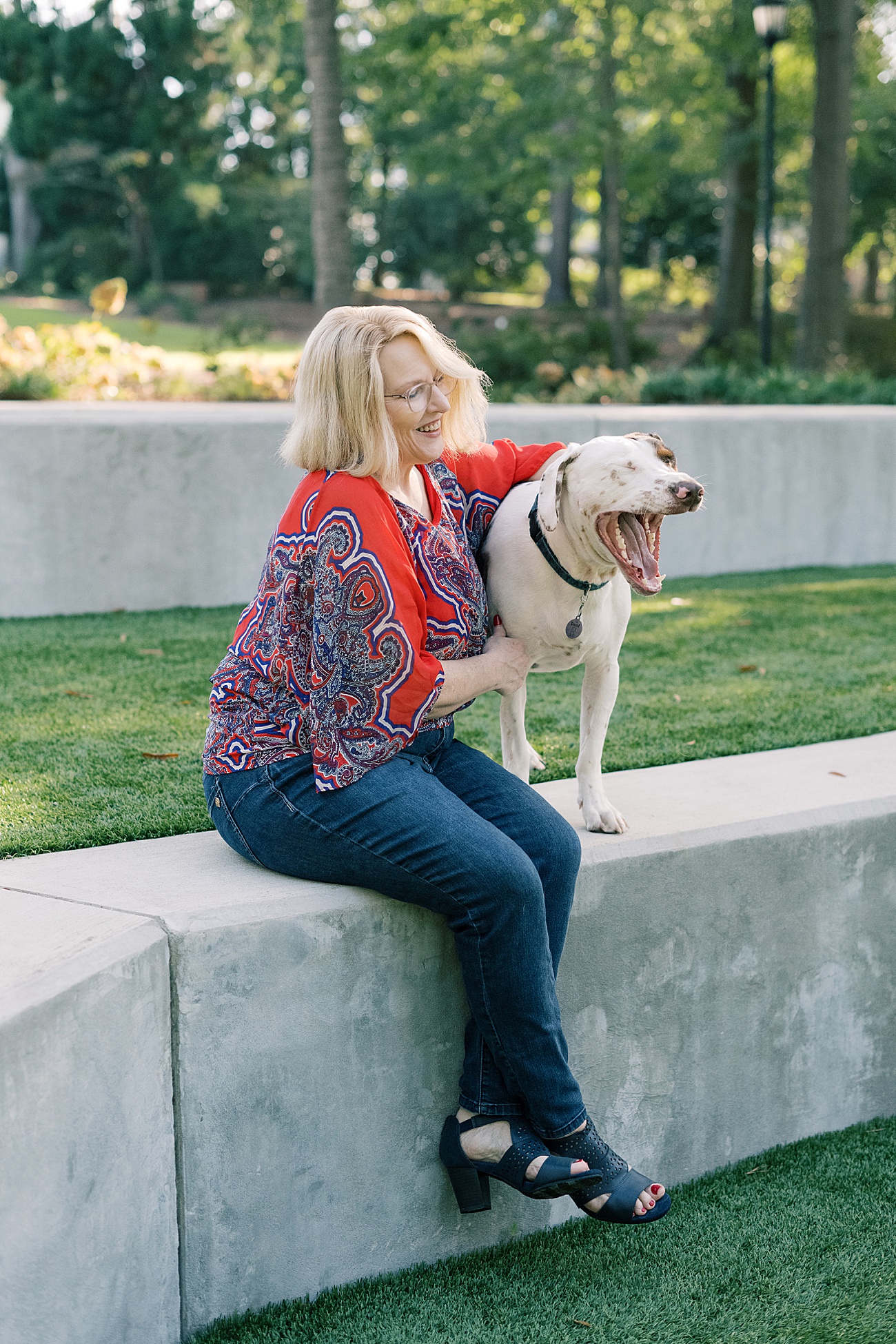 A portrait session of pet and owner.